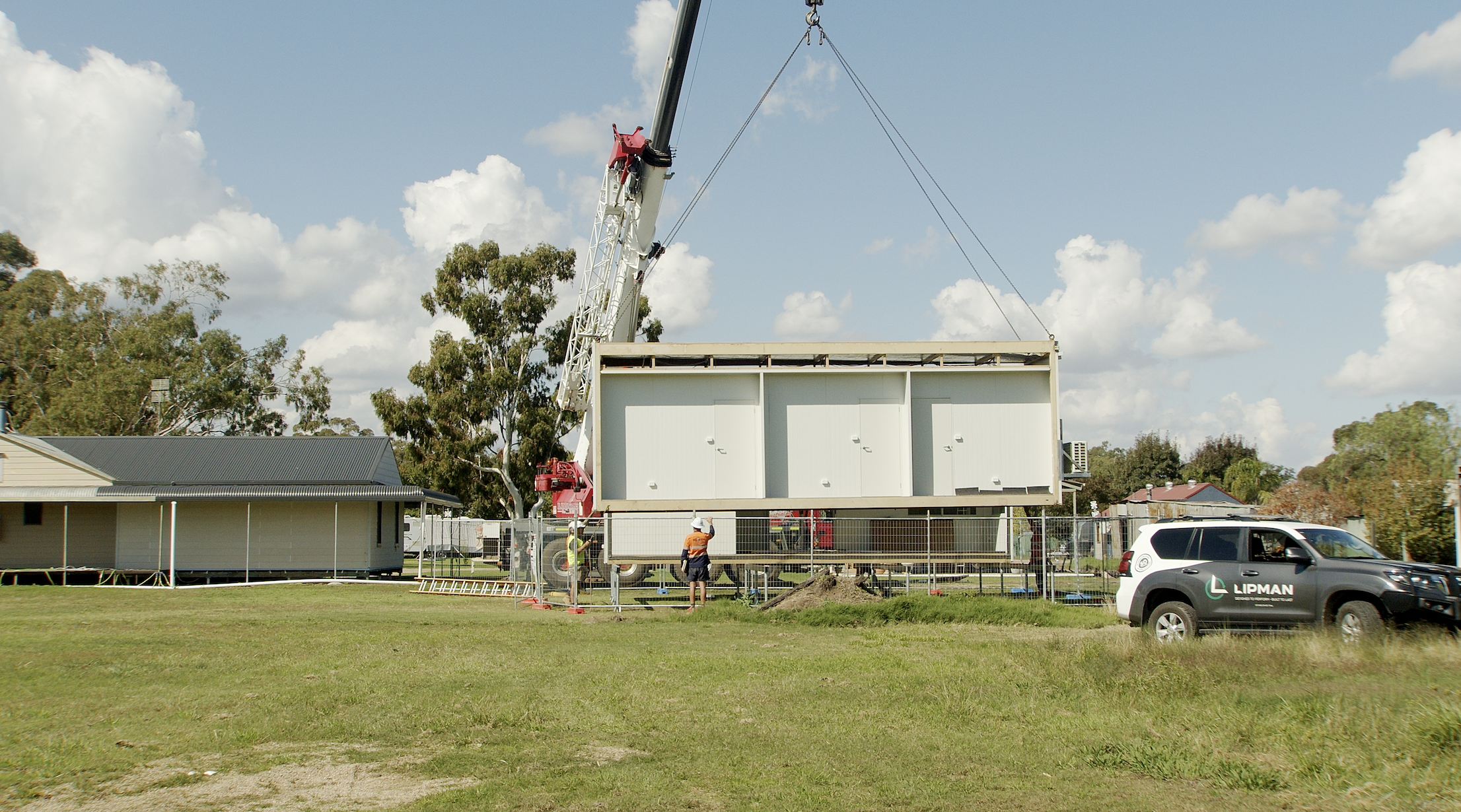 Pod home being craned into position.png
